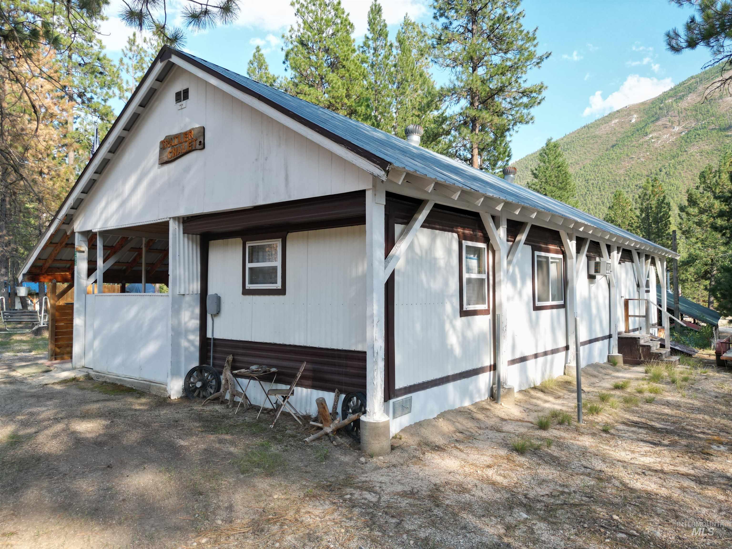 8395 Highway 21 Lowman, ID 83637 - Photo 2 of 22 View of side of property featuring a metal roof