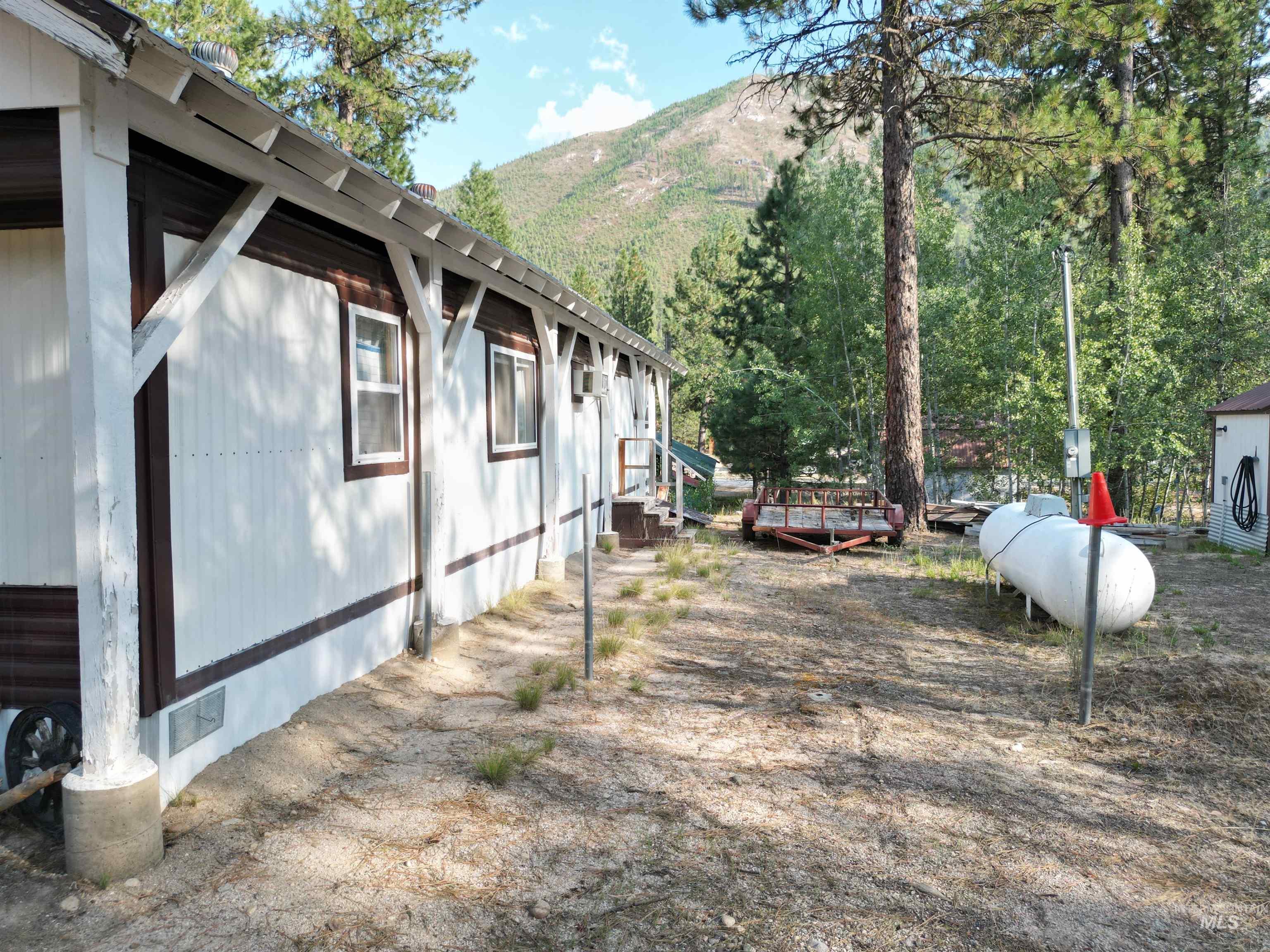 8395 Highway 21 Lowman, ID 83637 - Photo 7 of 22 View of side of home featuring a mountain view