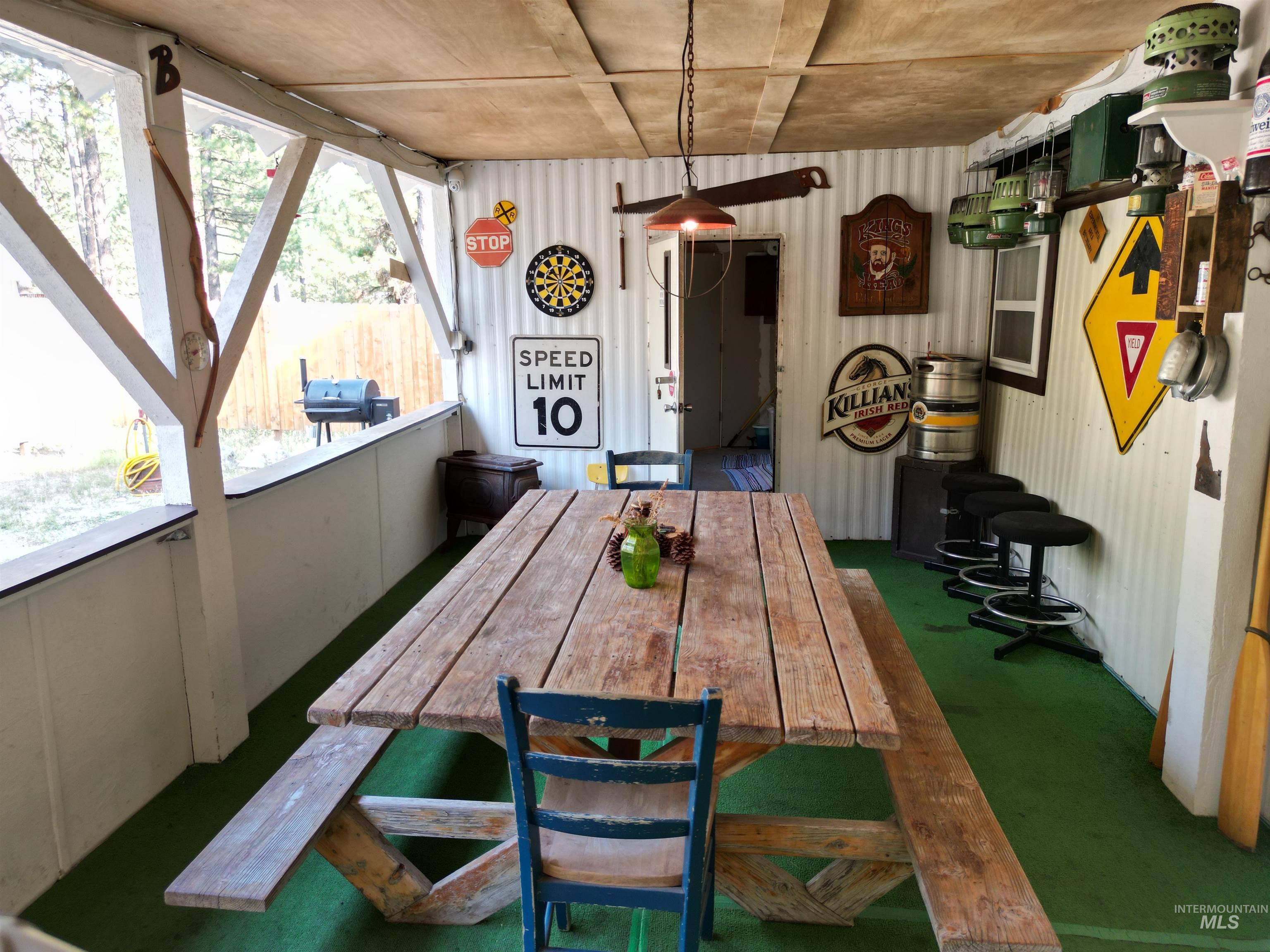 8395 Highway 21 Lowman, ID 83637 - Photo 9 of 22 Sunroom with outdoor dining space