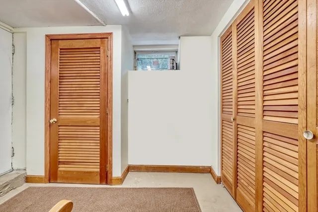 a view of a room that has a window