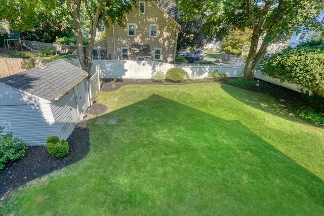 a view of a garden with houses