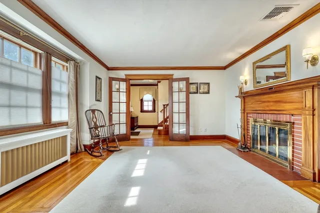 a view of a livingroom with furniture and a fireplace