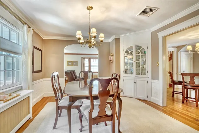 a view of a dining room with furniture window and outside view