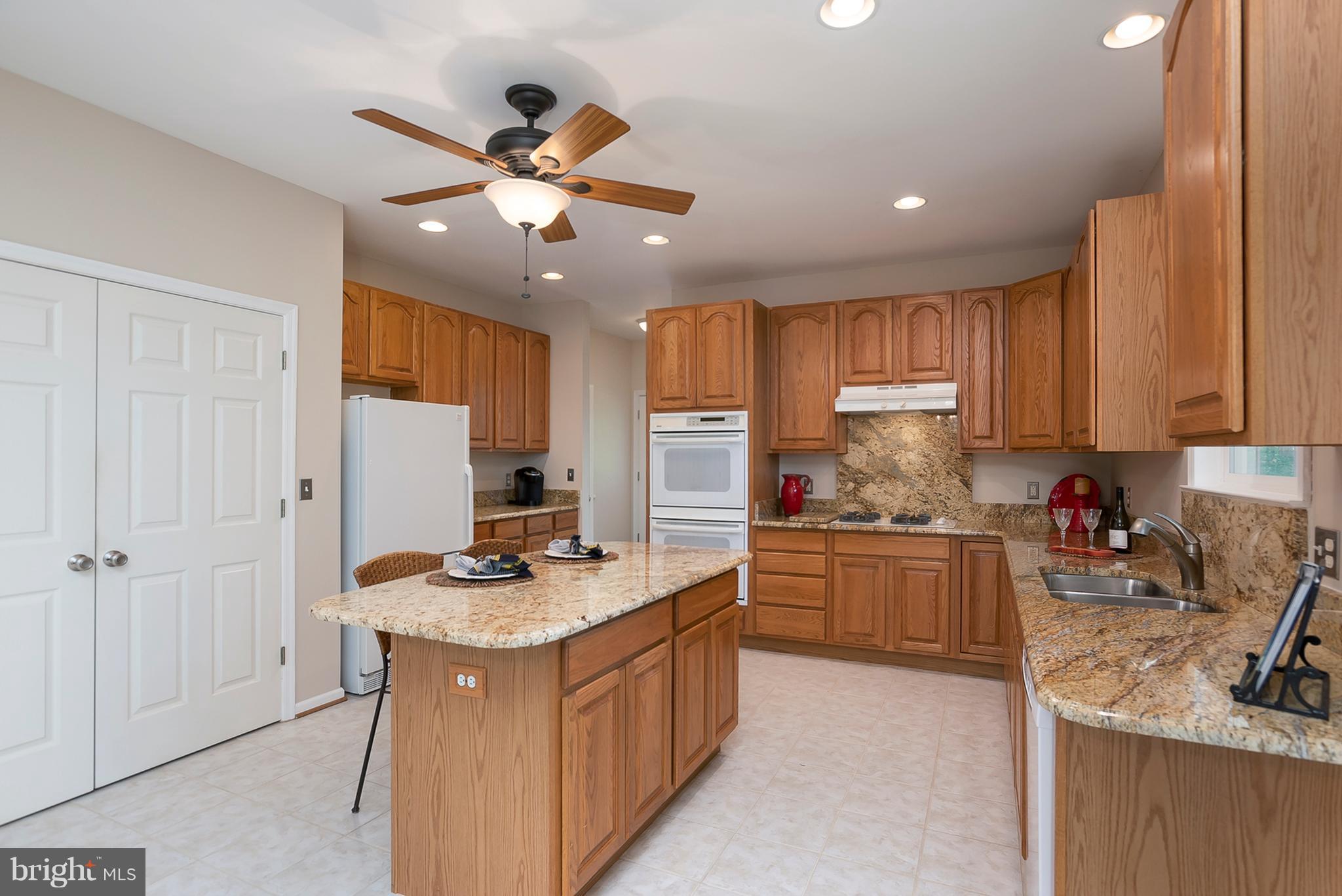 1551 Comanche Road Arnold, MD 21012 - Photo 7 of 30 Kitchen w/Granite Counters & Island