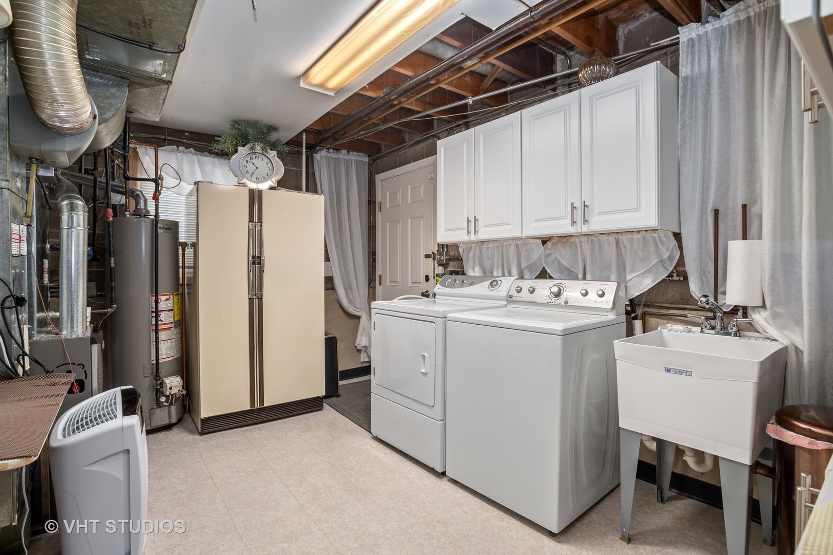 2227 South Wolf Road Des Plaines, IL 60018 - Photo 13 of 24 a utility room with dryer and washer