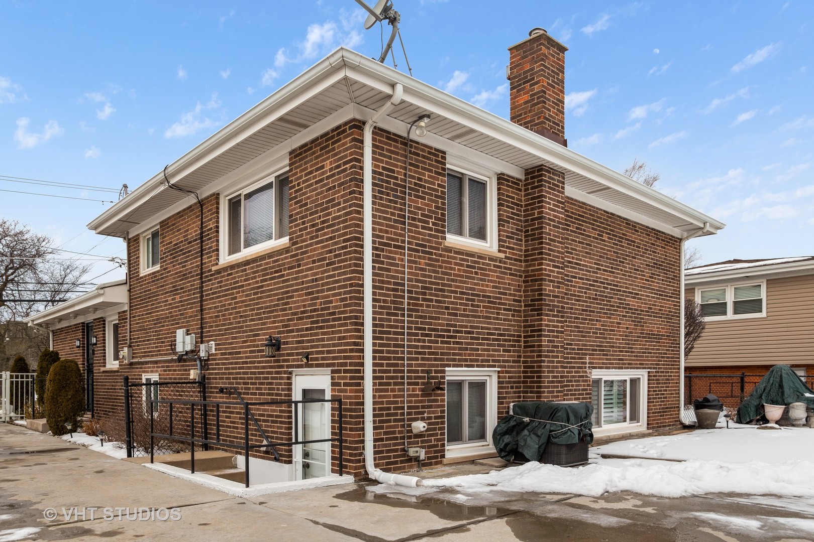 2227 South Wolf Road Des Plaines, IL 60018 - Photo 14 of 24 a front view of a house with a yard