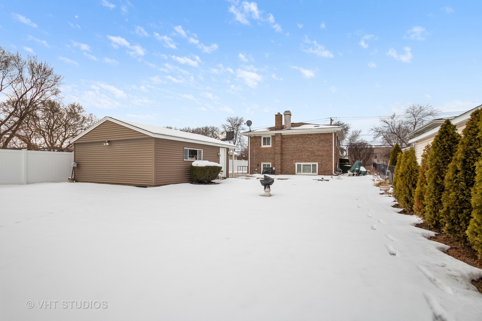2227 South Wolf Road Des Plaines, IL 60018 - Photo 16 of 24 a car parked in front of a house