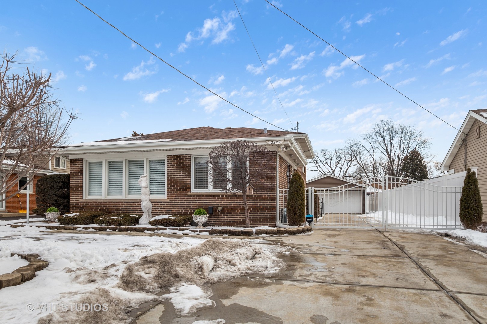 2227 South Wolf Road Des Plaines, IL 60018 - Photo 24 of 24 a front view of a house with a yard