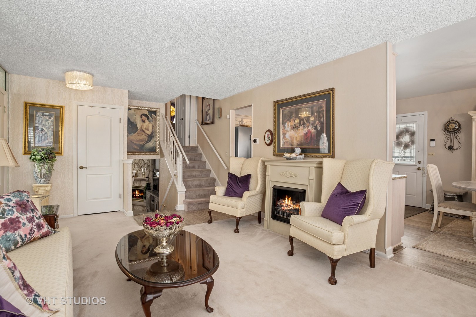 2227 South Wolf Road Des Plaines, IL 60018 - Photo 3 of 24 a living room with furniture and a fireplace