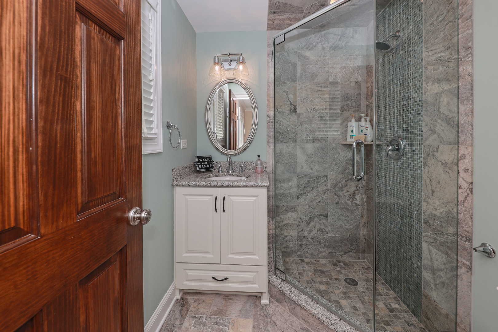 26000 Cottage Road Wilmington, IL 60481 - Photo 17 of 31 a bathroom with a sink a toilet and shower