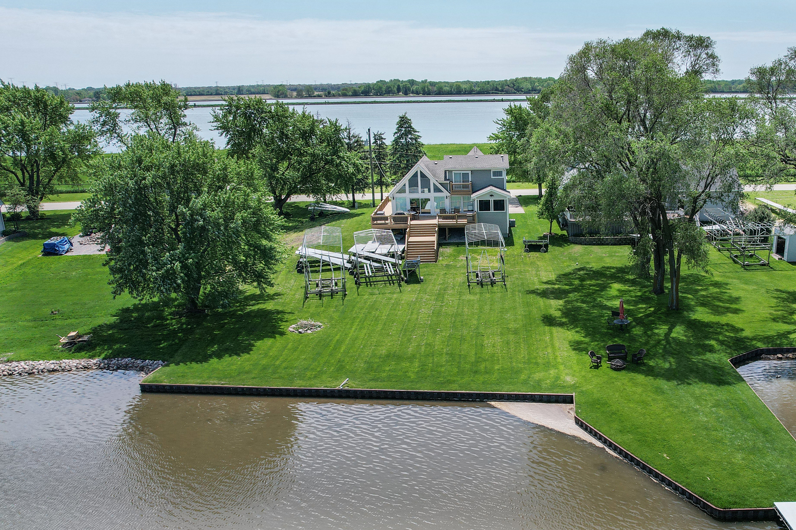 26000 Cottage Road Wilmington, IL 60481 - Photo 2 of 31 a view of a lake with a garden