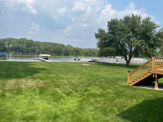 26000 Cottage Road Wilmington, IL 60481 - Photo 30 of 31 a view of a lake with a big yard
