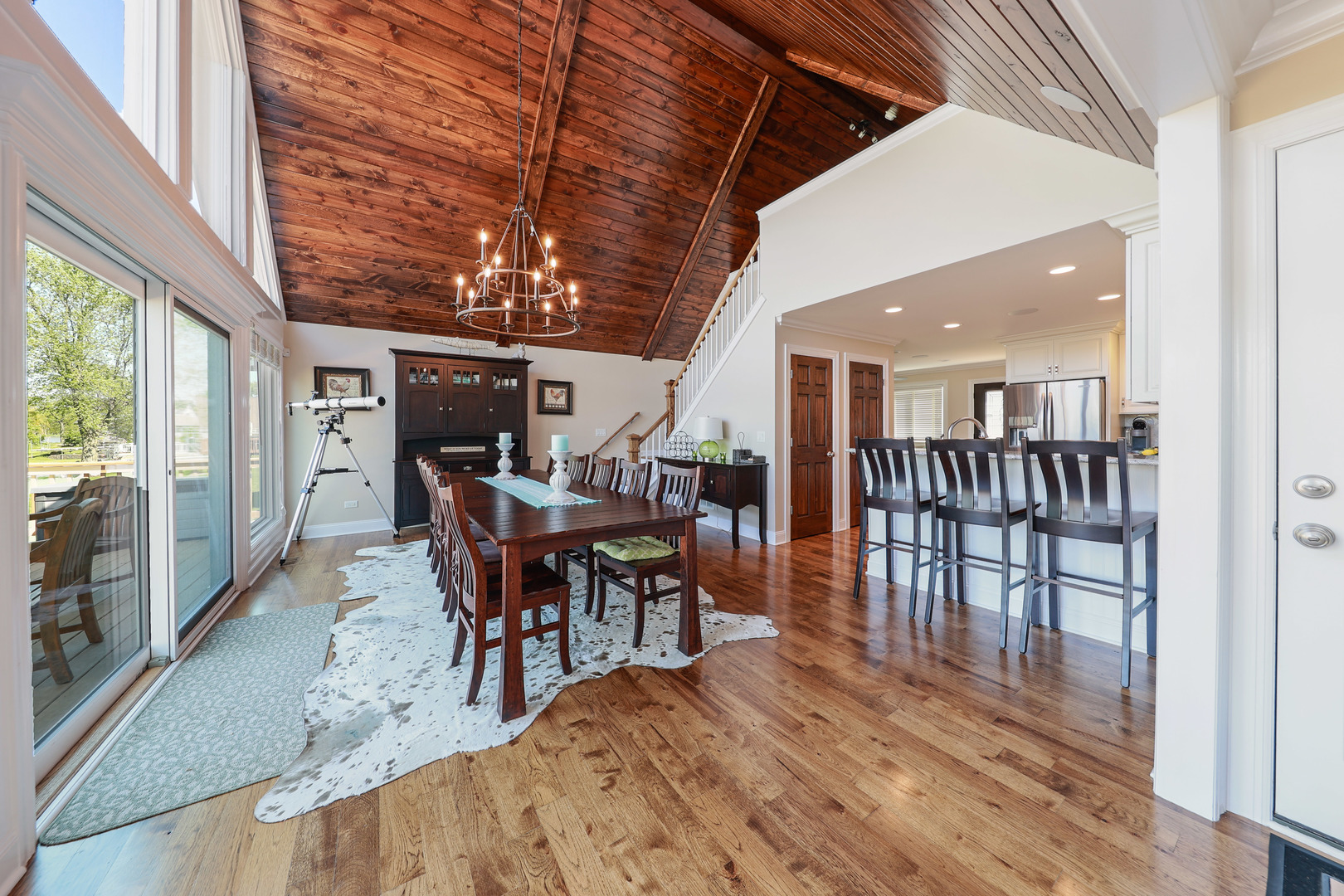 26000 Cottage Road Wilmington, IL 60481 - Photo 8 of 31 a dining room with furniture wooden floor and a rug