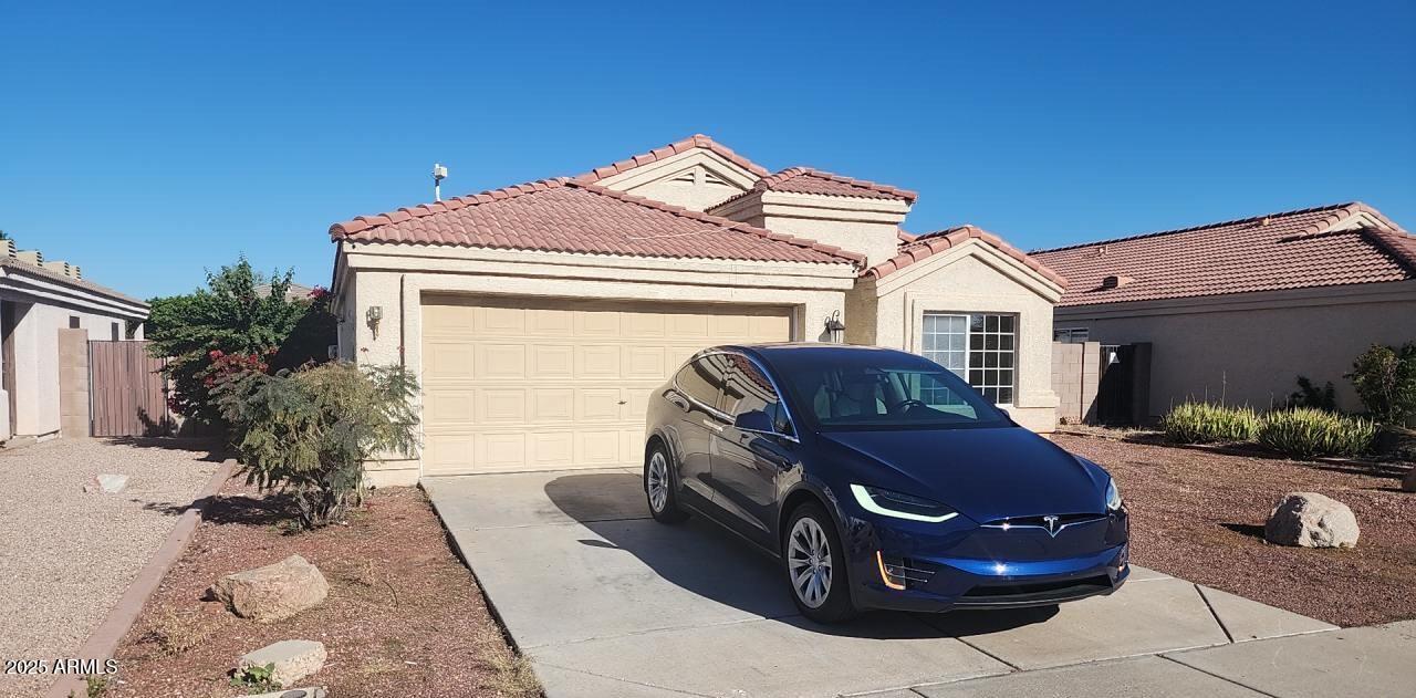 914 East Monterey Street Chandler, AZ 85225 - Photo 1 of 16 a view of a house with a patio
