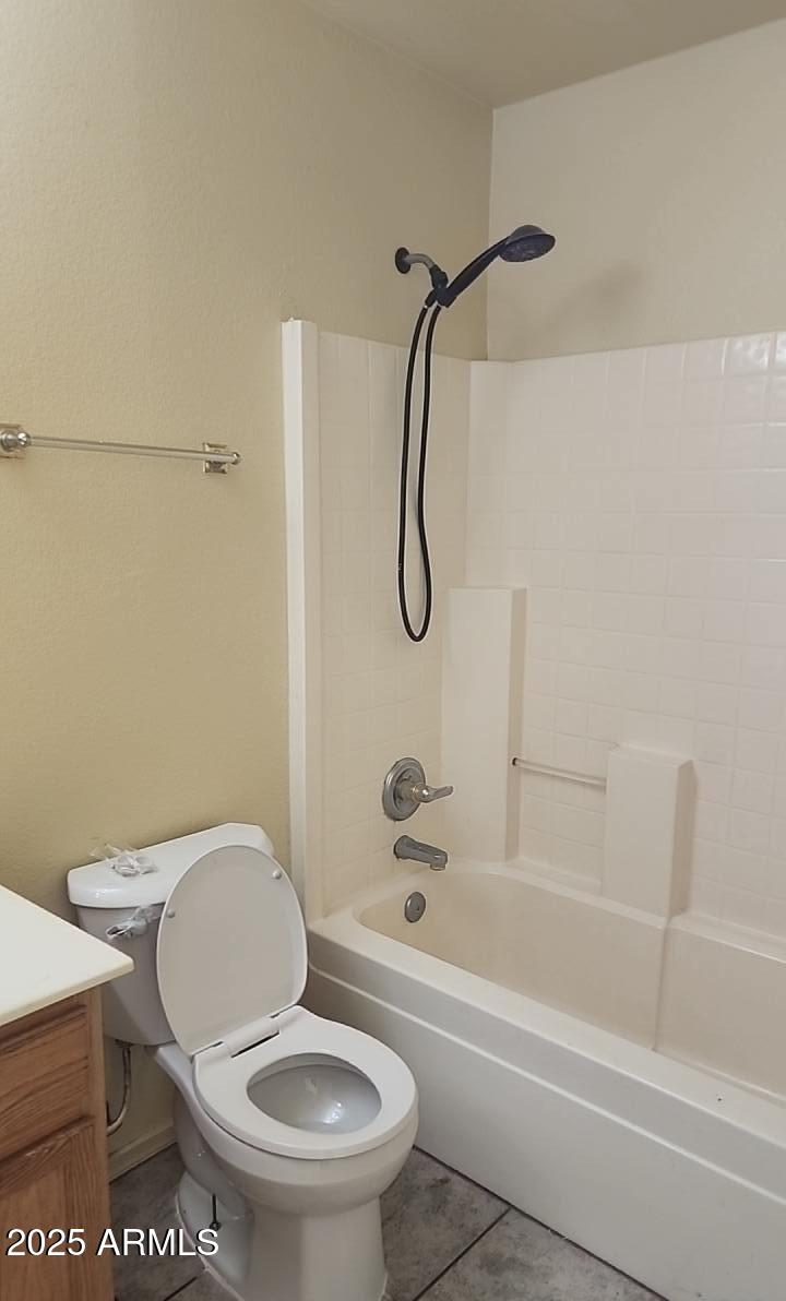914 East Monterey Street Chandler, AZ 85225 - Photo 13 of 16 a white toilet sitting next to a bath tub