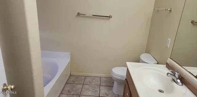 a bathroom with a sink and toilet