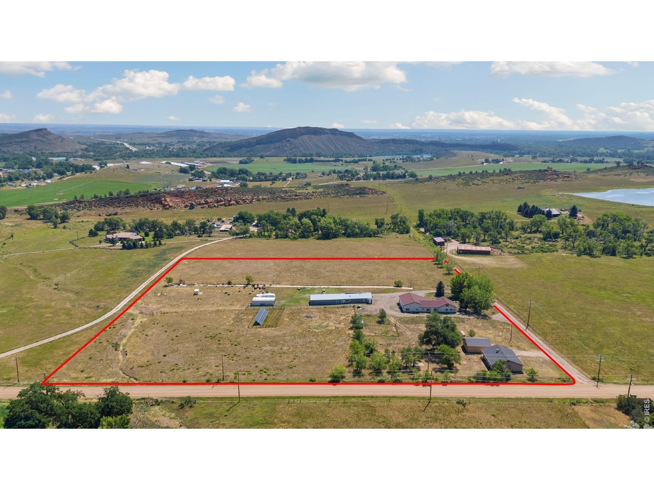 54 Rist View Road Bellvue, CO 80512 - Photo 1 of 50 Two Residences, Attached and Detached Garages, Huge Outbuilding, Solar Array all on 10 Acres!