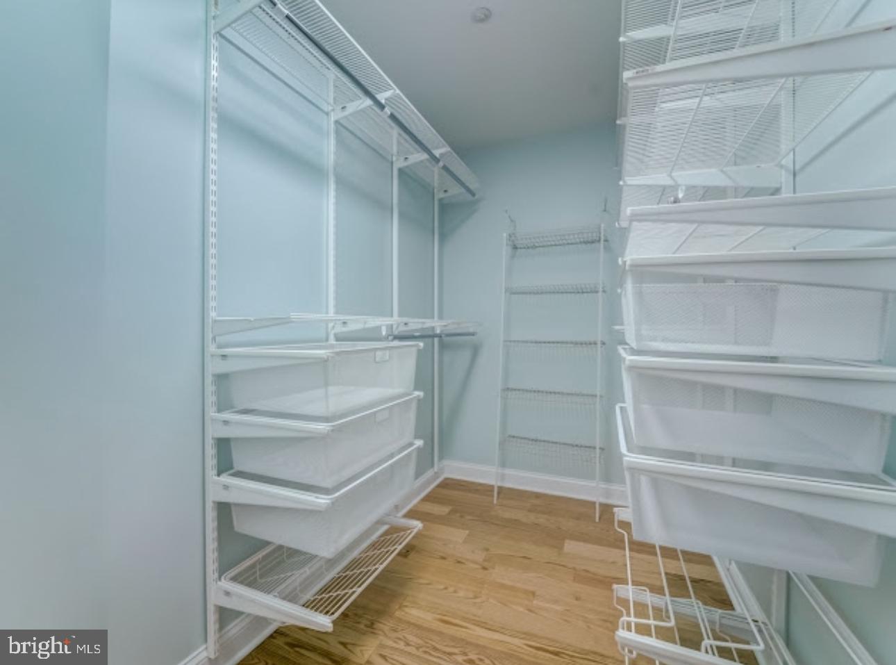 3313 Sir Thomas Drive Silver Spring, MD 20904 - Photo 10 of 15 a view of walk in closet with empty racks