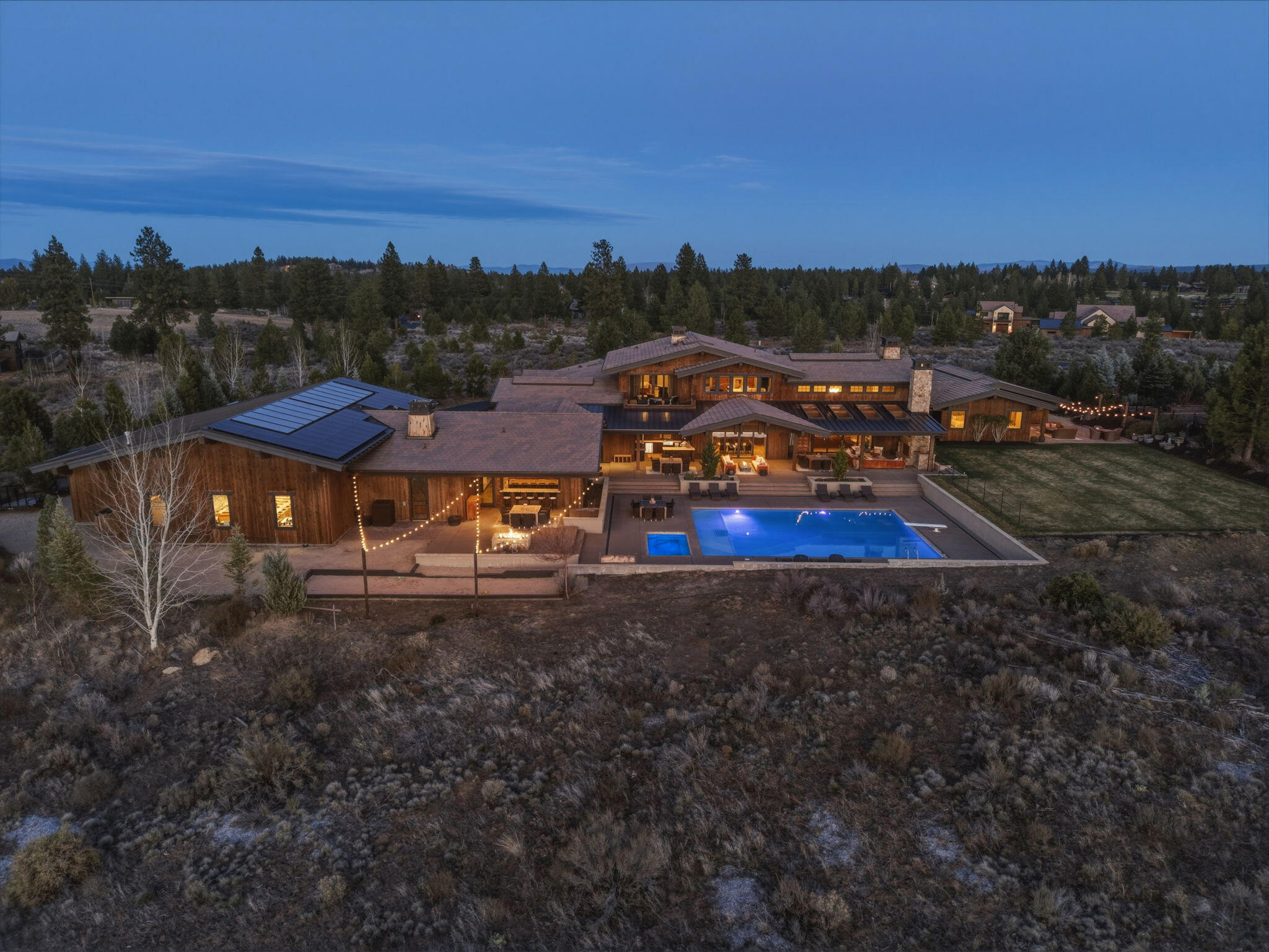 19100 Macalpine Loop Bend, OR 97702 - Photo 53 of 56 Aerial view of the estates outdoor living at sunset