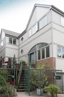 a front view of a house with stairs