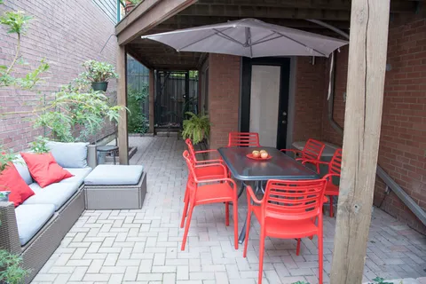 a outdoor space with patio the couches and a potted plant
