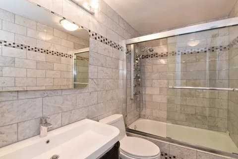 a bathroom with a sink and a bathtub