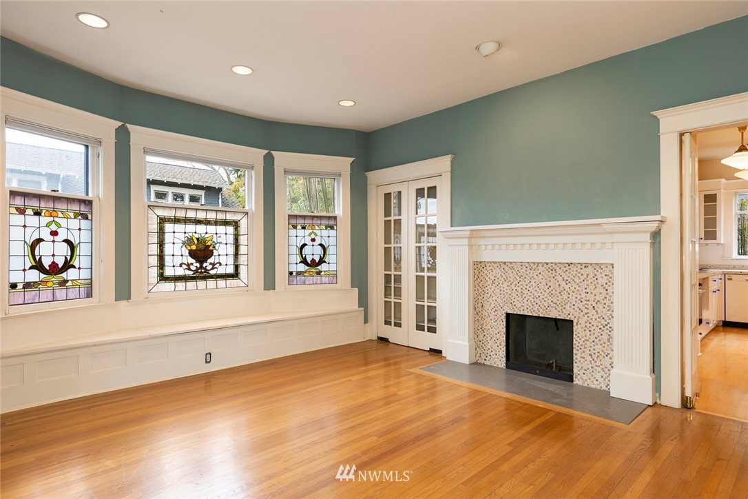 4233 Meridian Avenue North Seattle, WA 98103 - Photo 12 of 40 a view of an empty room with a window and fireplace