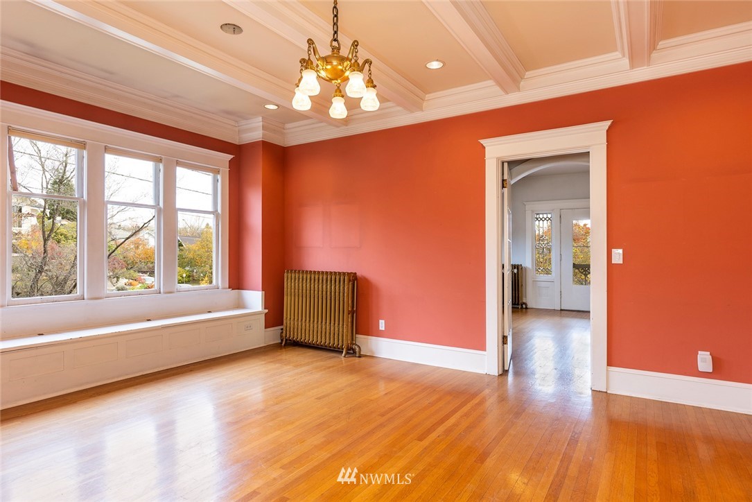 4233 Meridian Avenue North Seattle, WA 98103 - Photo 13 of 40 a view of a livingroom with furniture window and wooden floor