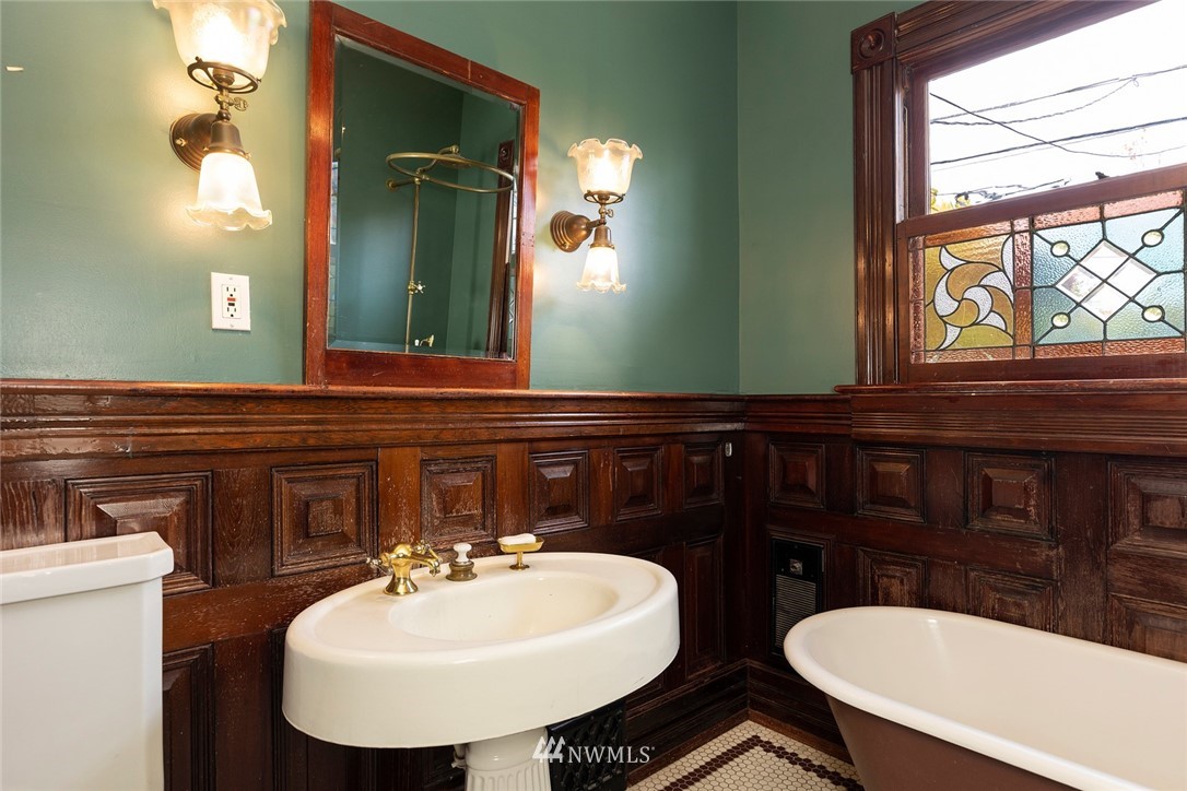 4233 Meridian Avenue North Seattle, WA 98103 - Photo 19 of 40 a bathroom with a sink and a mirror