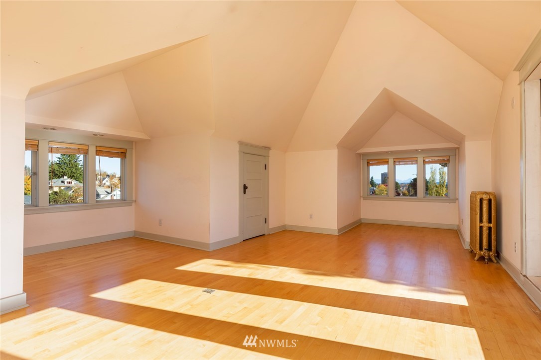 4233 Meridian Avenue North Seattle, WA 98103 - Photo 31 of 40 a view of a room with window and wooden floor
