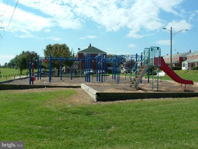 2806 Moorgate Road Dundalk, MD 21222 - Photo 4 of 19 a park with lots of swings and slides