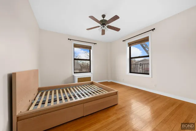 a view of livingroom with hardwood floor and ceiling fan