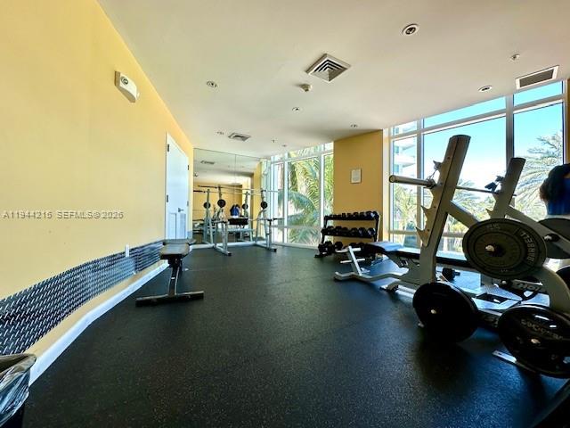 1755 East Hallandale Beach Boulevard, Unit 1605E Hallandale Beach, FL 33009 - Photo 11 of 12 a view of a room with gym equipment