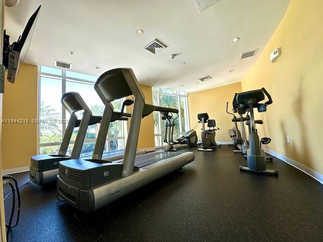 1755 East Hallandale Beach Boulevard, Unit 1605E Hallandale Beach, FL 33009 - Photo 9 of 12 a view of a room with gym equipment