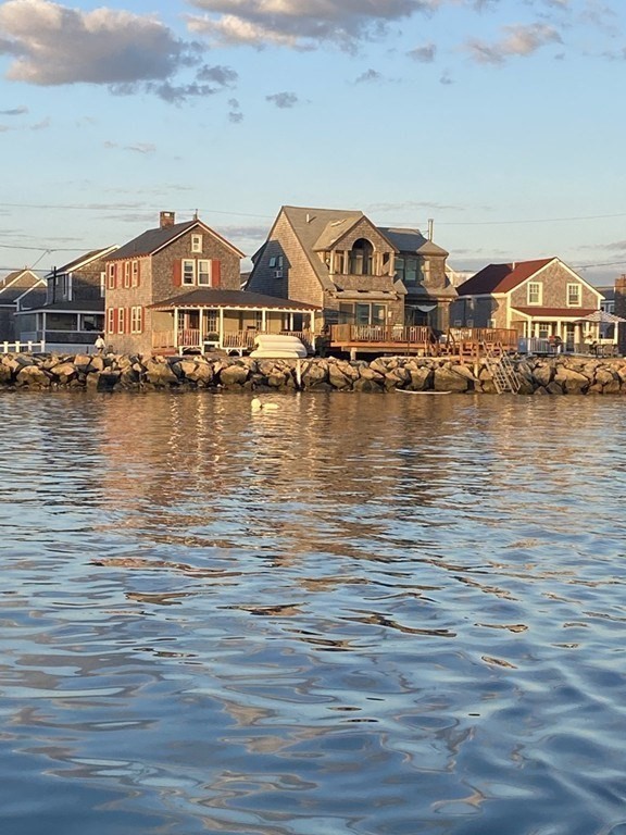 64 Lighthouse Road Scituate, MA 02066 - Photo 23 of 23 a front view of a building with lake view