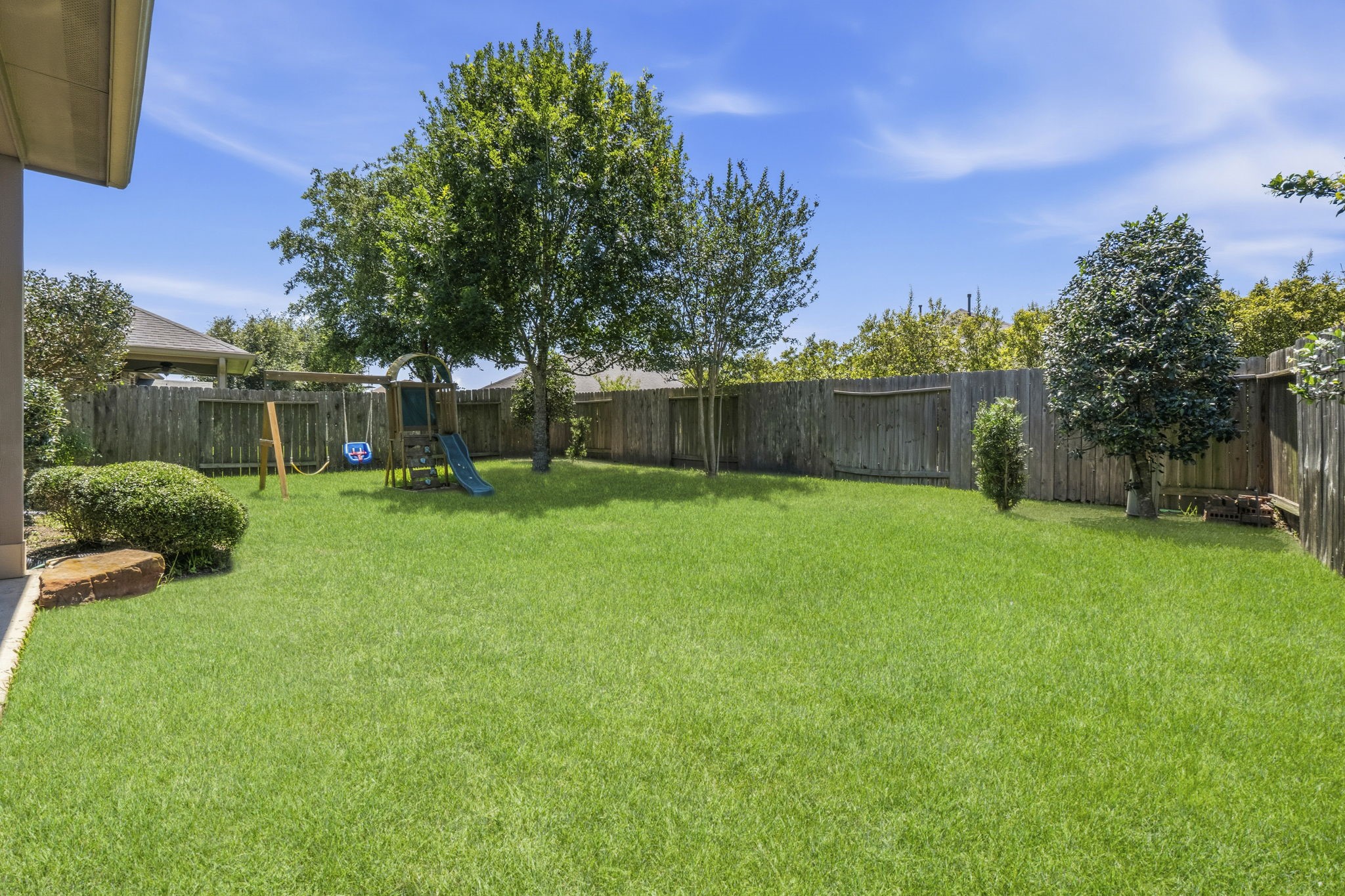 3900 Enchanted Timbers Lane Spring, TX 77386 - Photo 5 of 49 a view of a backyard with a garden