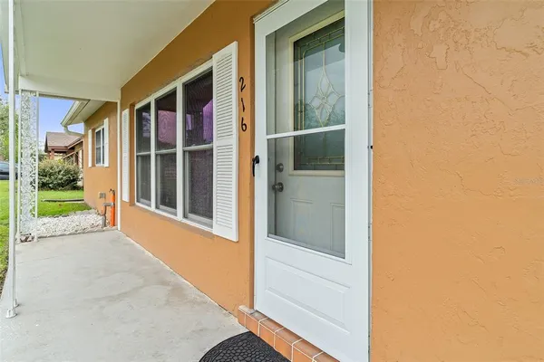 front view of a house and a yard