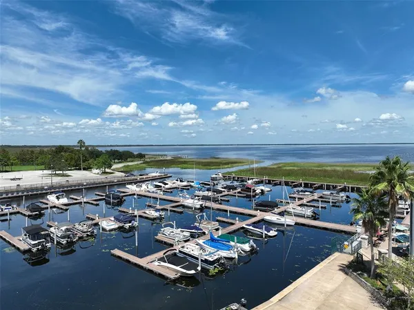 a view of a lake with a yard