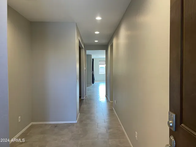 a view of hallway with livingroom