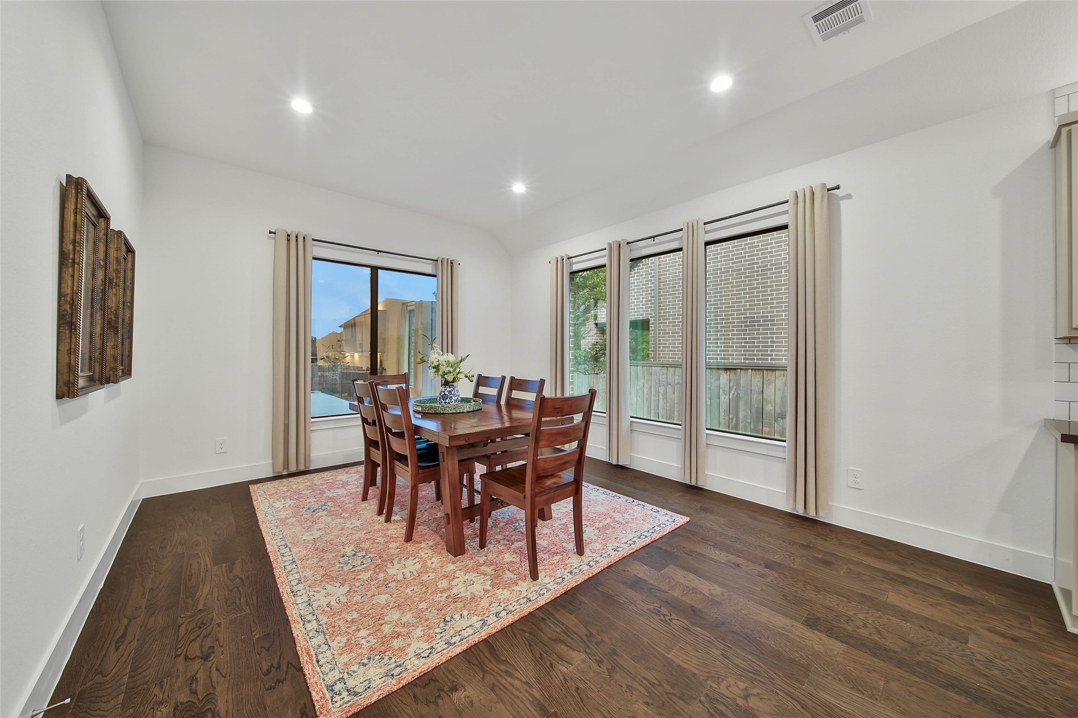 1015 Oak Briar Lane Conroe, TX 77384 - Photo 25 of 50 a view of a dining room with furniture and wooden floor