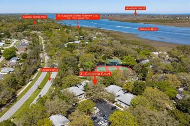 a view of outdoor space and front view of a house