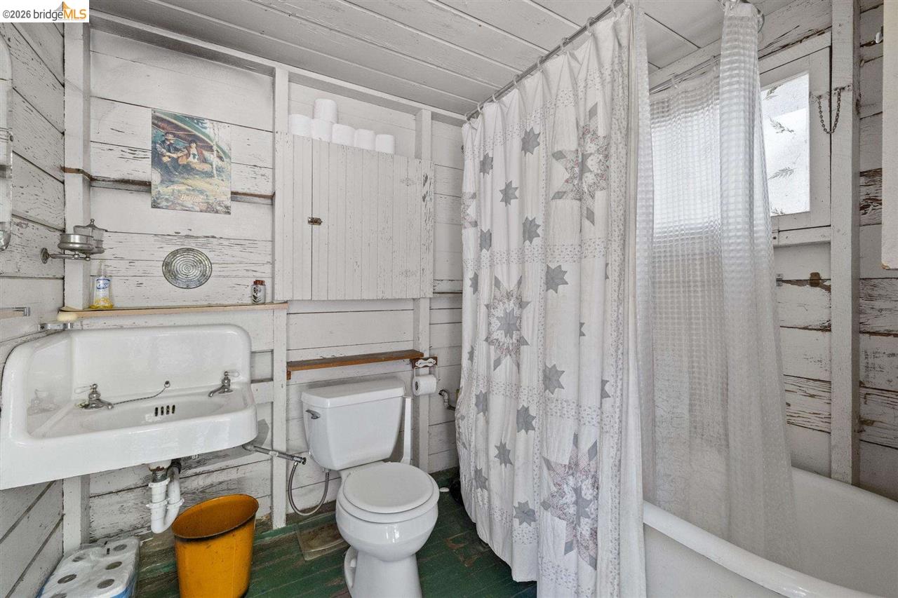 7 Riverside Tract Kyburz, CA 95720 - Photo 13 of 25 a bathroom with a sink toilet and shower