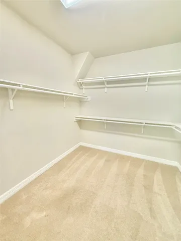a view of a room with racks on the wall