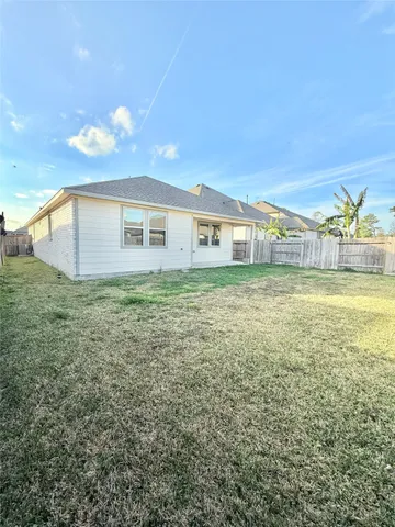 a view of a house with a garden