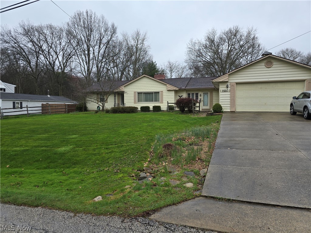 2550 Merria Road Stow, OH 44224 - Photo 1 of 22 Single story home with a front lawn and a garage