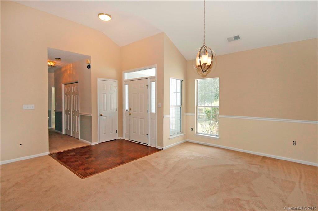 11931 Harris Ridge Drive Charlotte, NC 28269 - Photo 3 of 19 a view of an empty room with a window