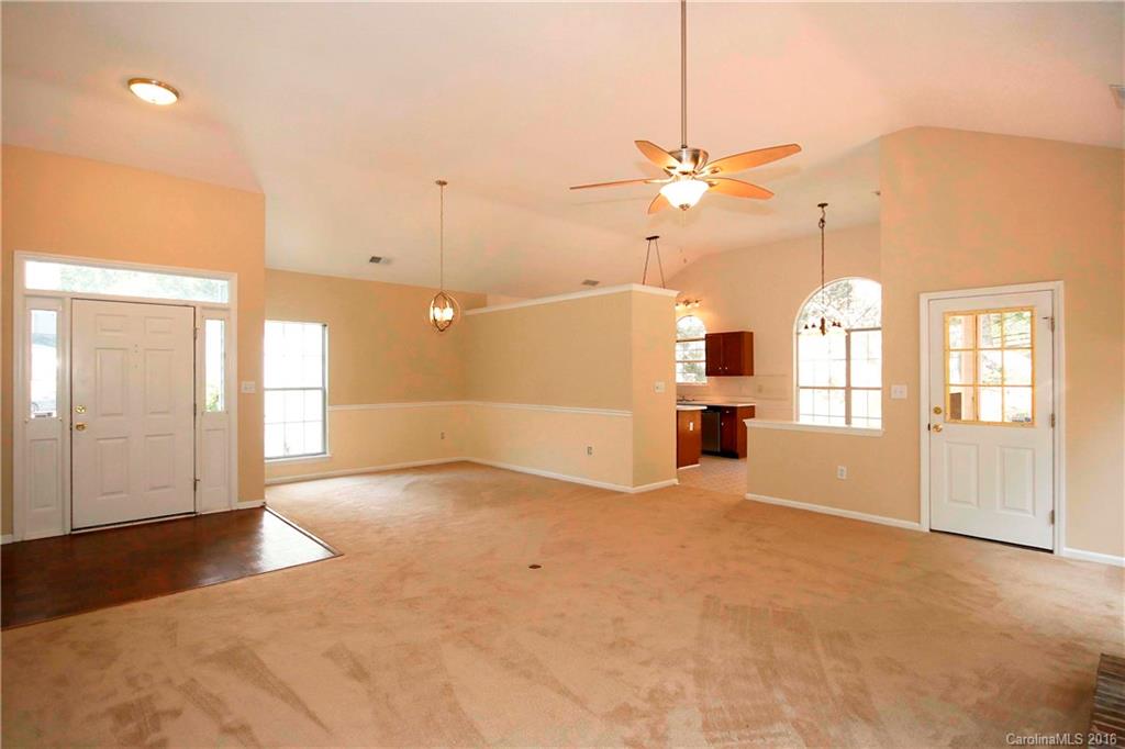 11931 Harris Ridge Drive Charlotte, NC 28269 - Photo 4 of 19 a view of an empty room with a window
