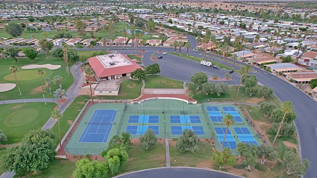 an aerial view of a residential houses and city view
