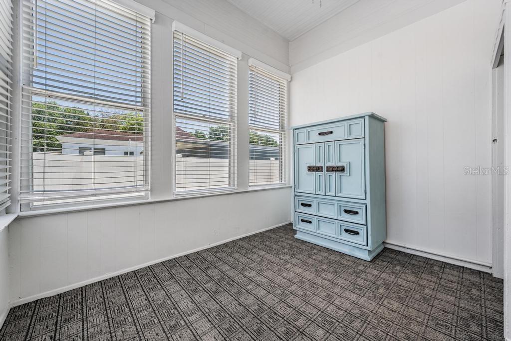 2319 West Aileen Street, Unit B Tampa, FL 33607 - Photo 14 of 19 an empty room with windows