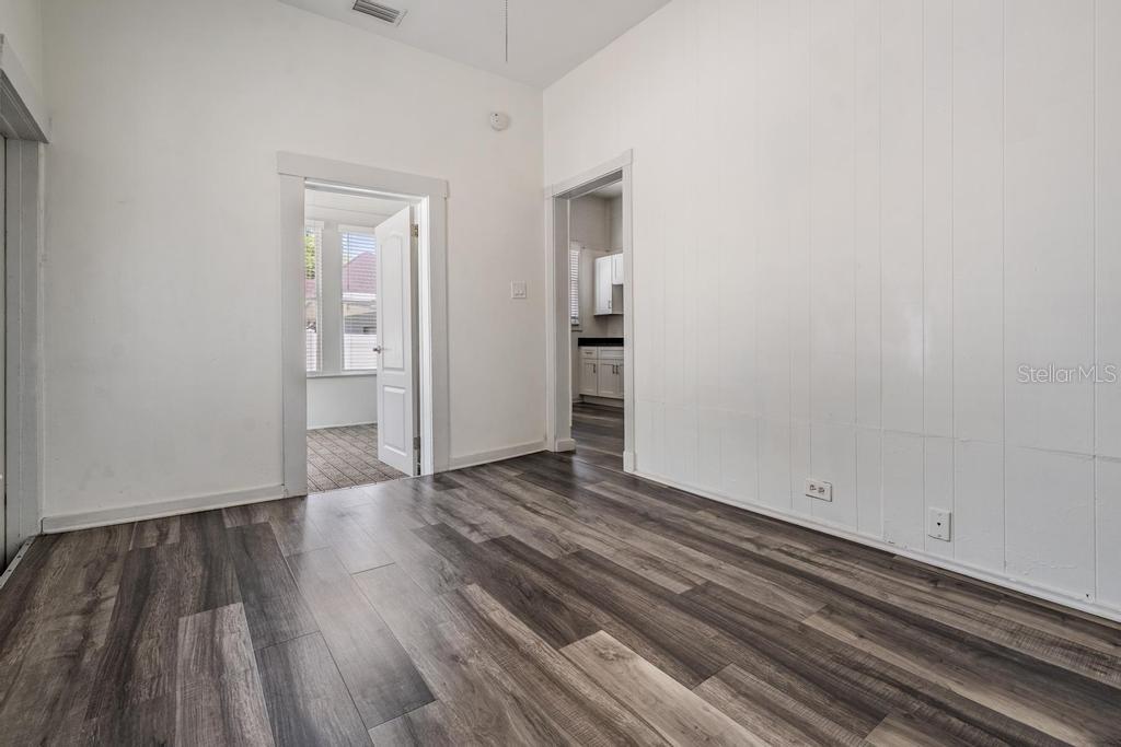 2319 West Aileen Street, Unit B Tampa, FL 33607 - Photo 7 of 19 a view of wooden floor in an empty room